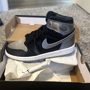 Nike youth Black and Metallic Sneakers